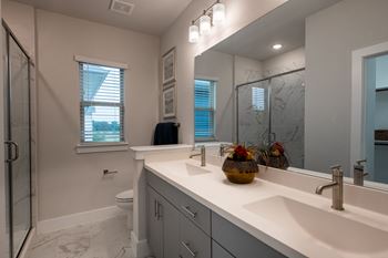 Bathroom with a large mirror